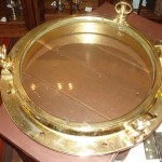 polished brass lacquer | ship porthole | after