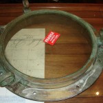 polished brass lacquer | ship porthole | before